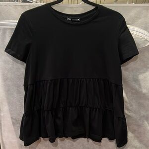 Black flowy shirt with ruffled bottom from Zara